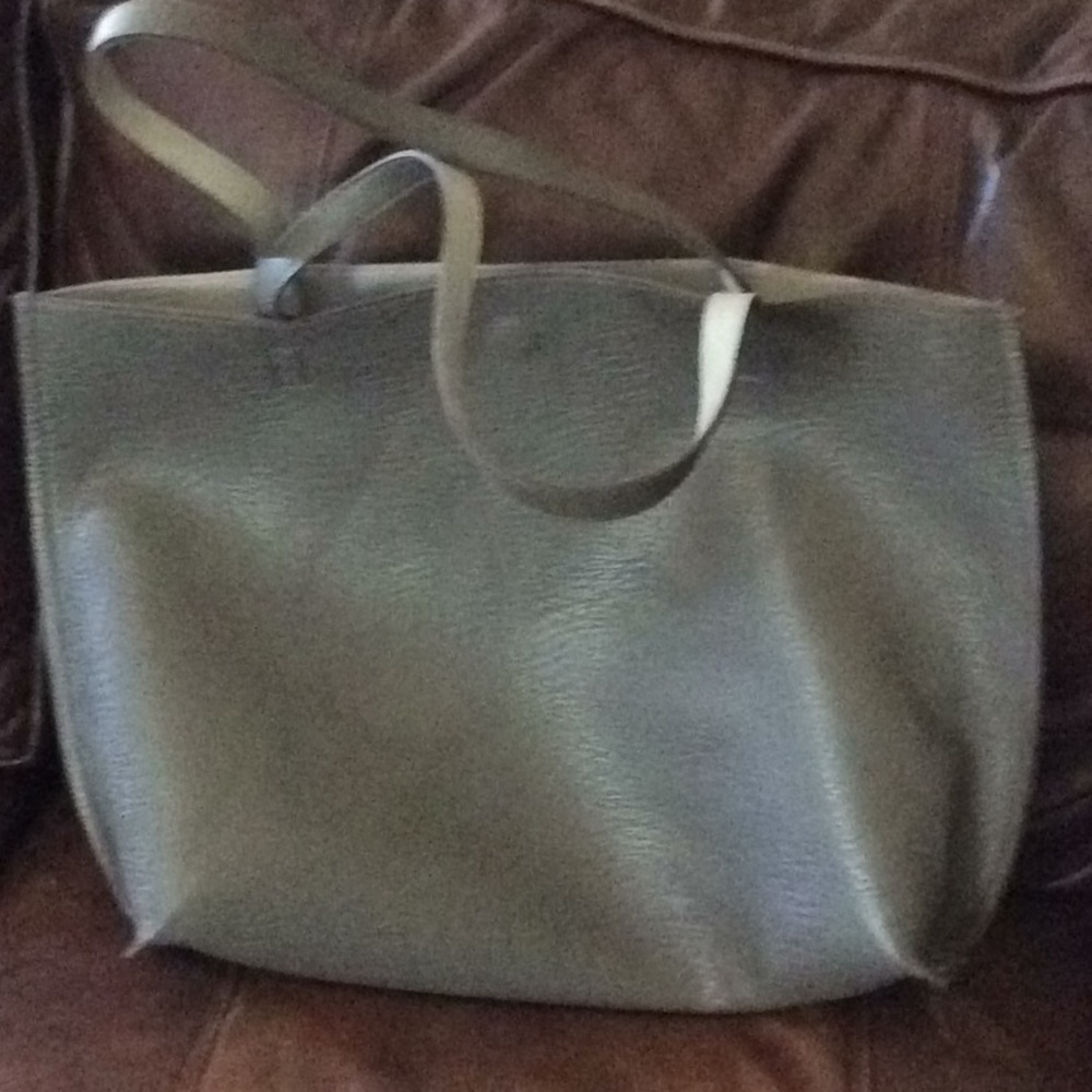 Reversible faux leather purse